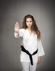 judo girl stop with hand - image quittingmainimage-233x300 on https://thedreamcatch.com