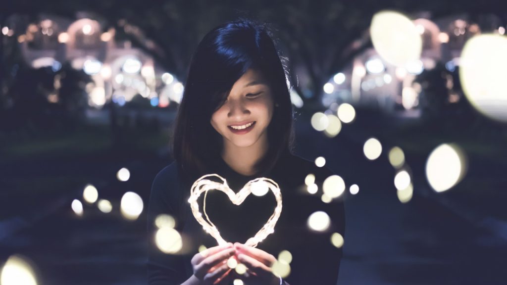 The Importance of Balancing Your Emotions with Logic - image asian-women-smiling-lights-heart-black-hair-1024x576 on https://thedreamcatch.com