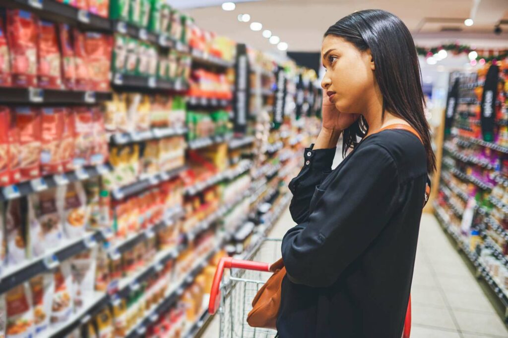 How to Cope with Decision Fatigue and Make Smarter Choices - image woman-supermarket-1024x683 on https://thedreamcatch.com